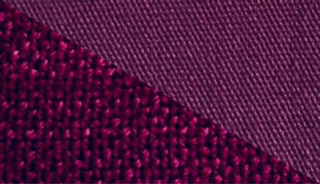 Fabric swatch dyed in wine red, demonstrating the vibrant color achieved with our fabric dye on different textures and fibres